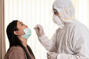 medical-staff-with-ppe-suit-test-coronavirus-covid-19-asian-woman_63253-8482